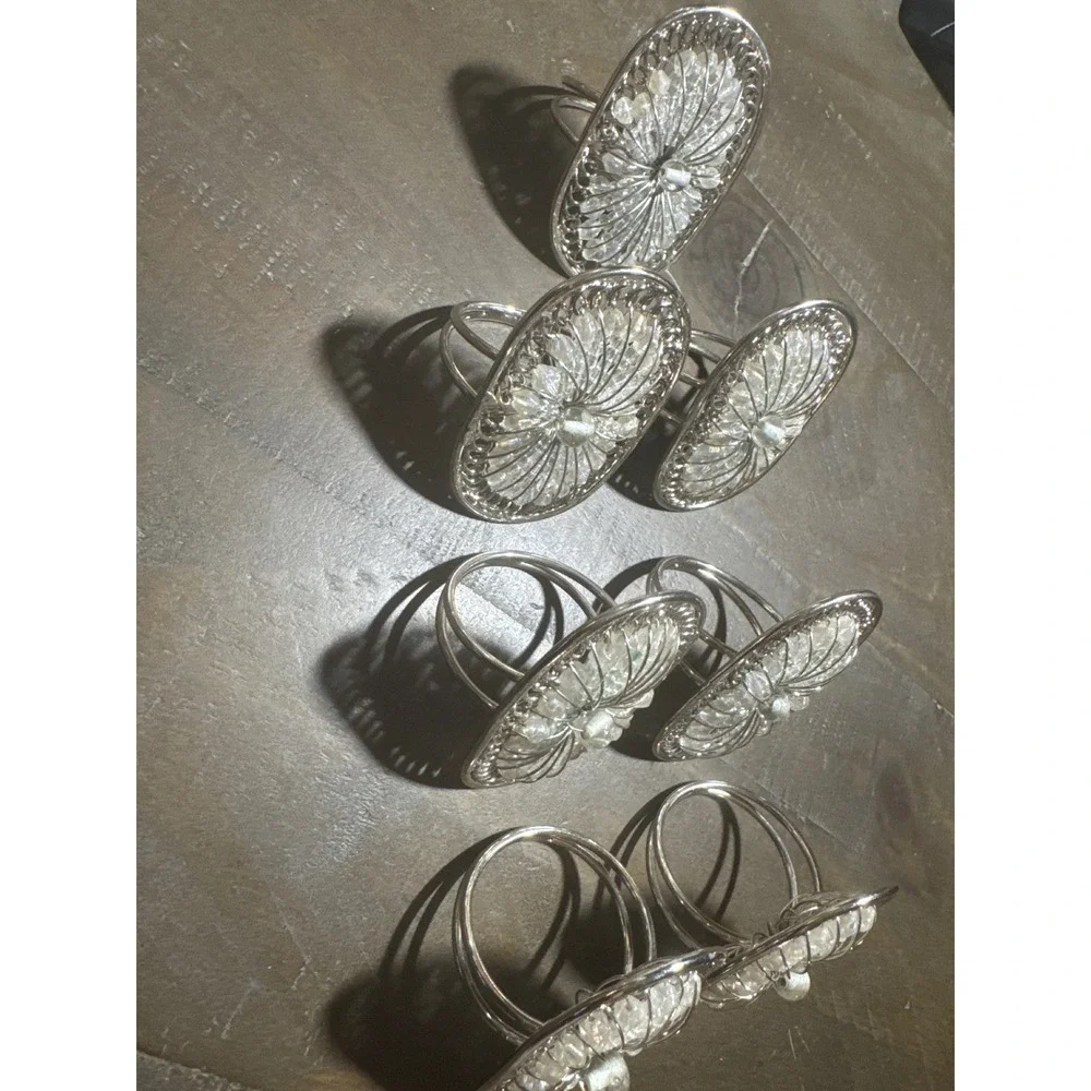 Pier 1 Set of 7 Silver Tone Beaded Filigree Oval Napkin Rings Clear Starburst